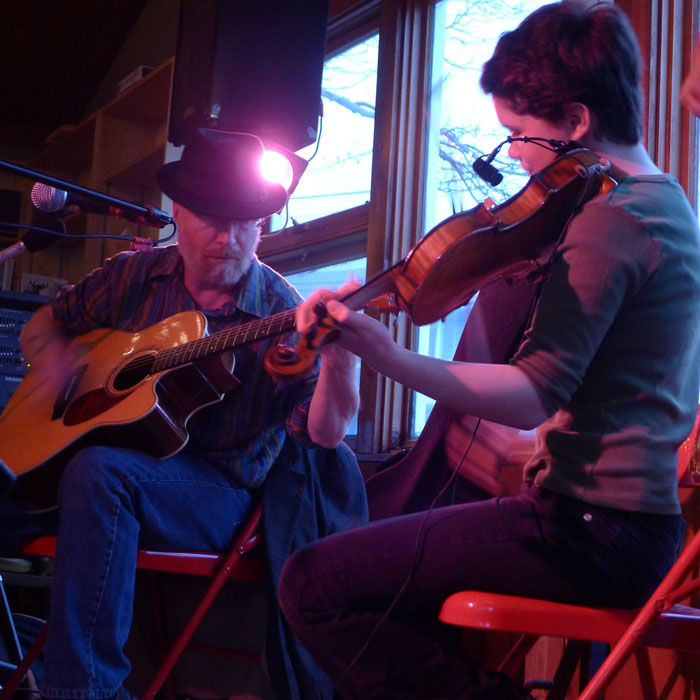 Emma and CHuck on the spotlight stage